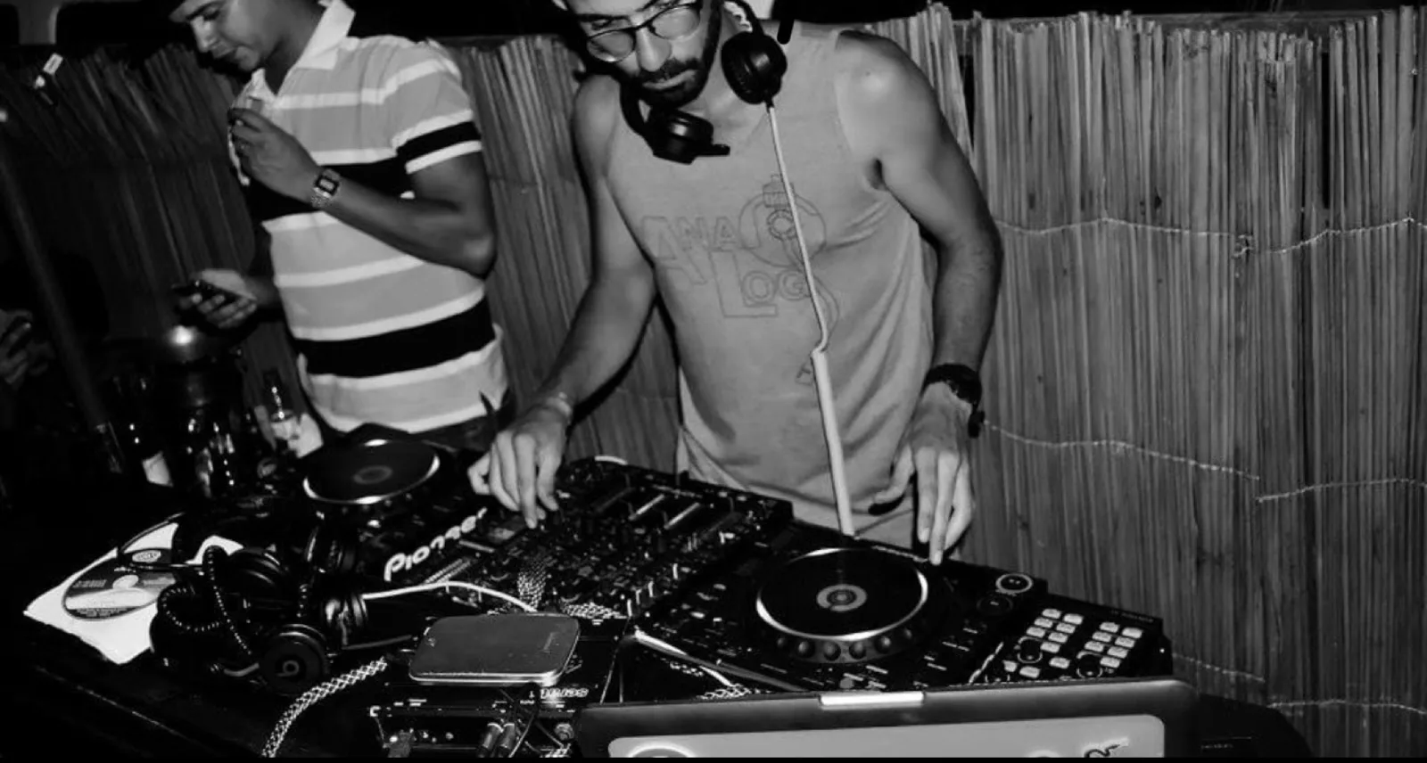 Archival black-and-white image of KULAS at the decks.
